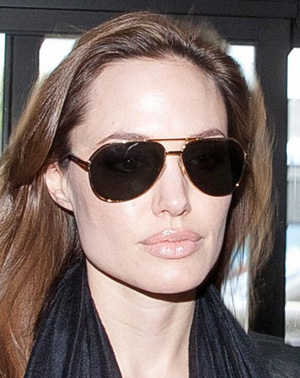 VERSACE on X: Angelina Jolie looking radiant wearing a pair of #Versace  rose gold mirrored Aviator sunglasses. #VersaceCelebrities   / X
